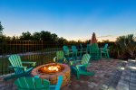 This home boasts a extended deck with firepit